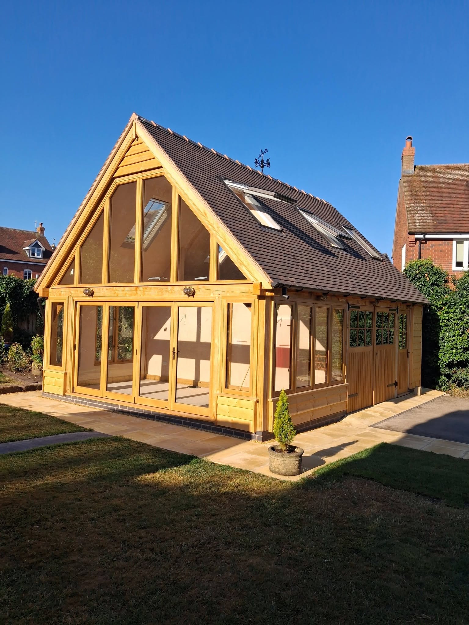 Finished oak garage with games room dormers, gable end view