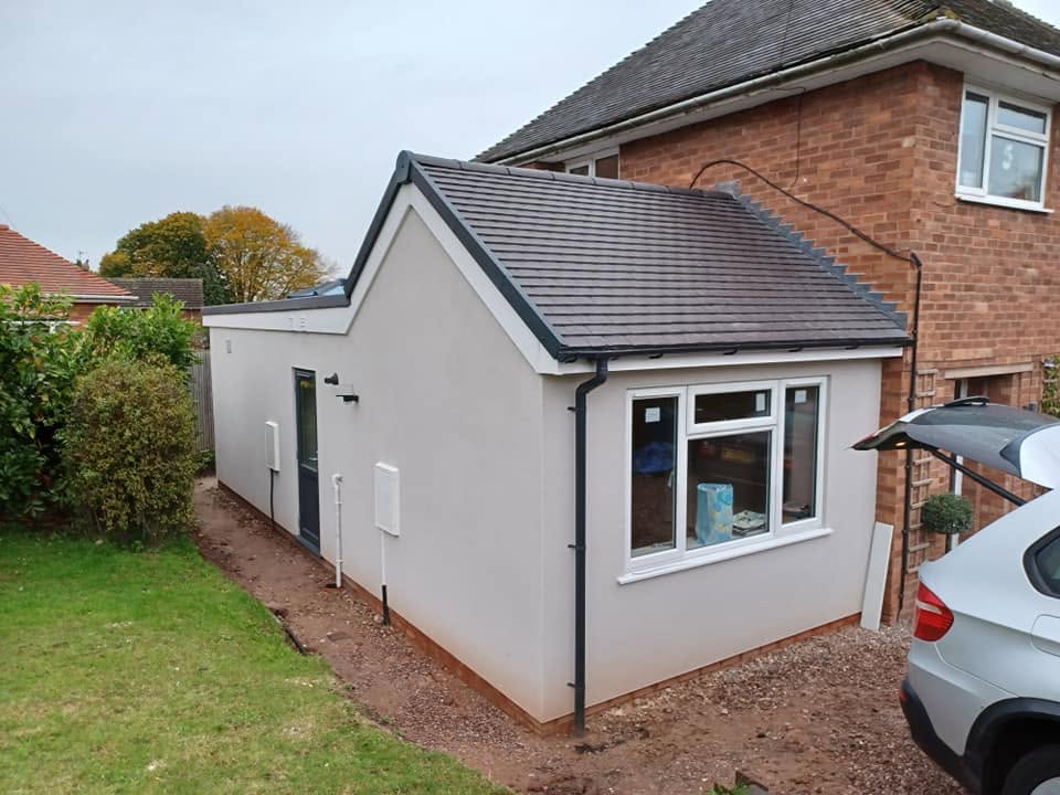 Finished rendered side extension with pitched tiled roof, Eccleshall