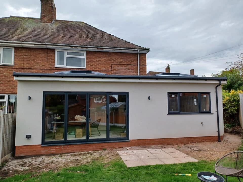 Rendered rear extension with anthracite bi-fold doors, Eccleshall
