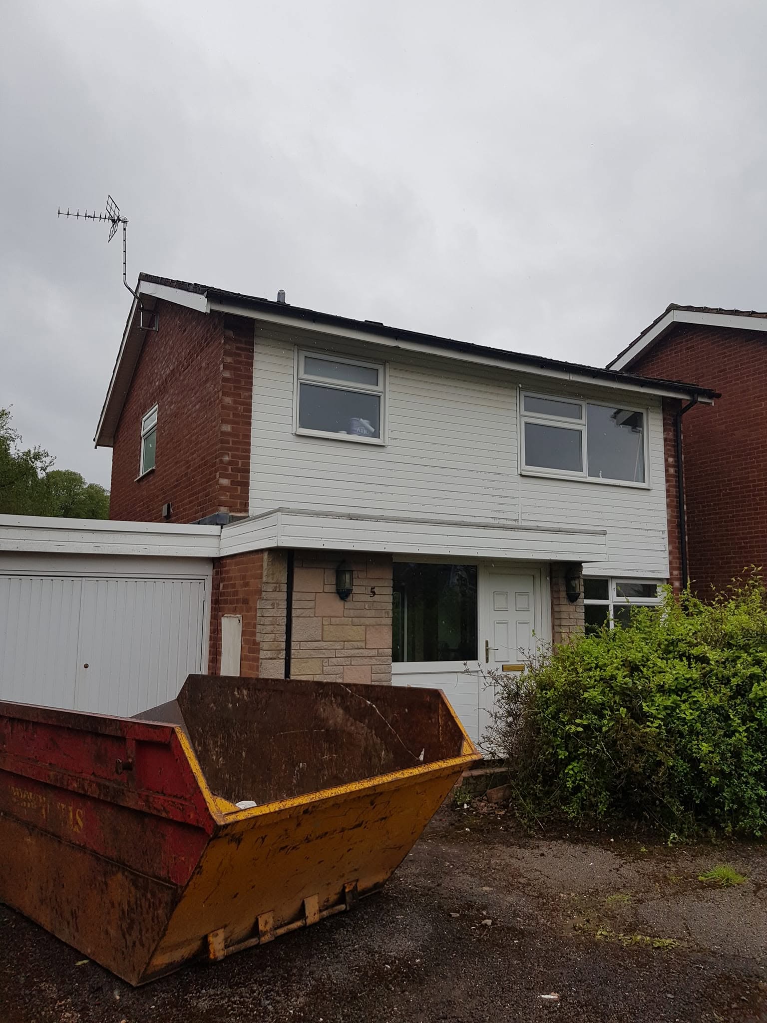 Overgrown front garden before facelift, Lichfield