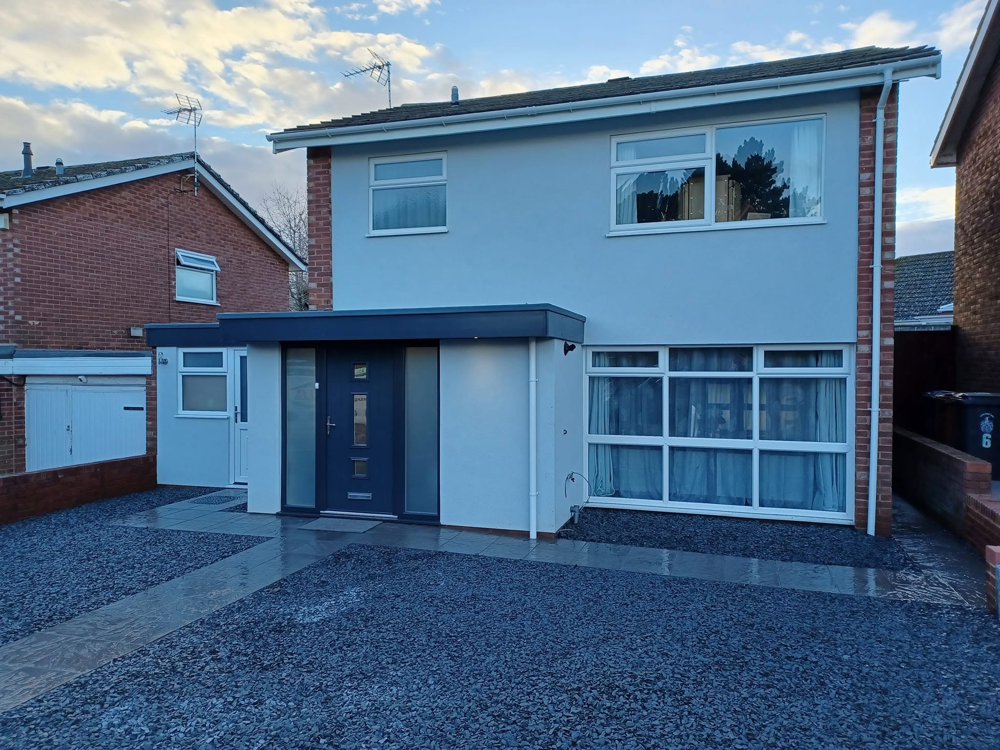 Finished house frontage with new render and slate chippings, Lichfield
