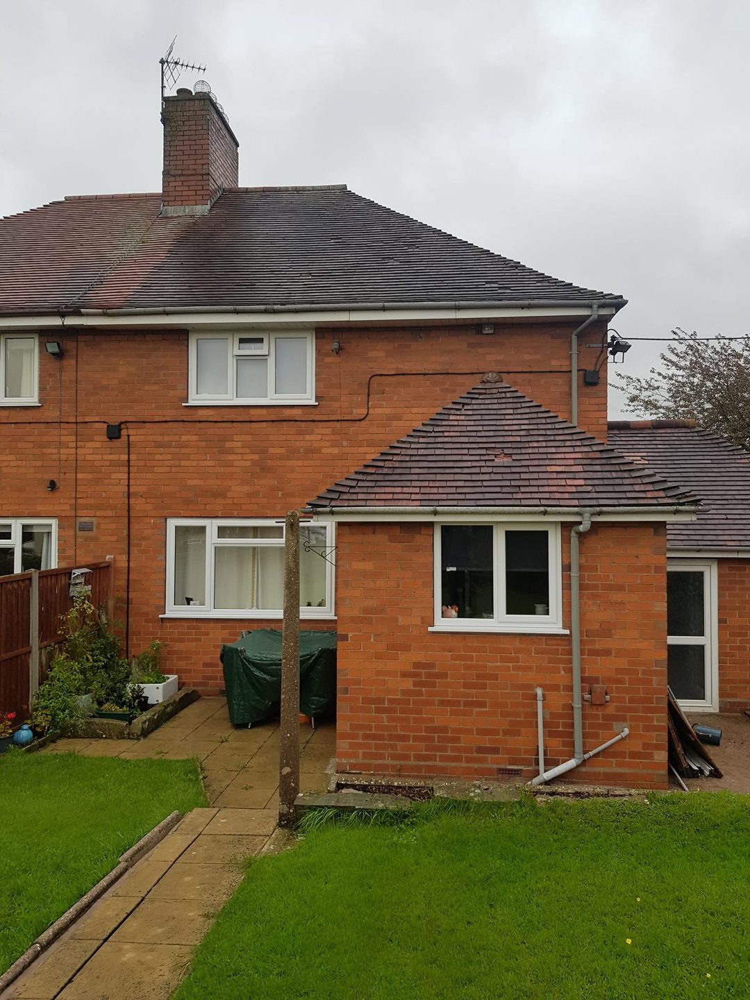 Rear of semi-detached house with brick back porch, before, Eccleshall
