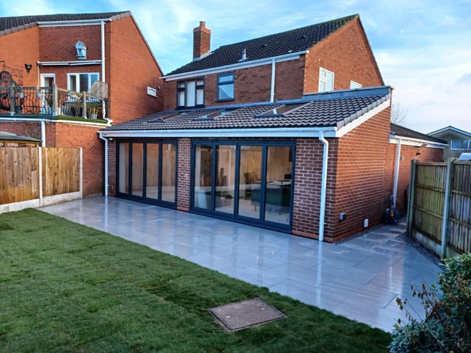 Finished rear extension with porcelain patio, Stonnall